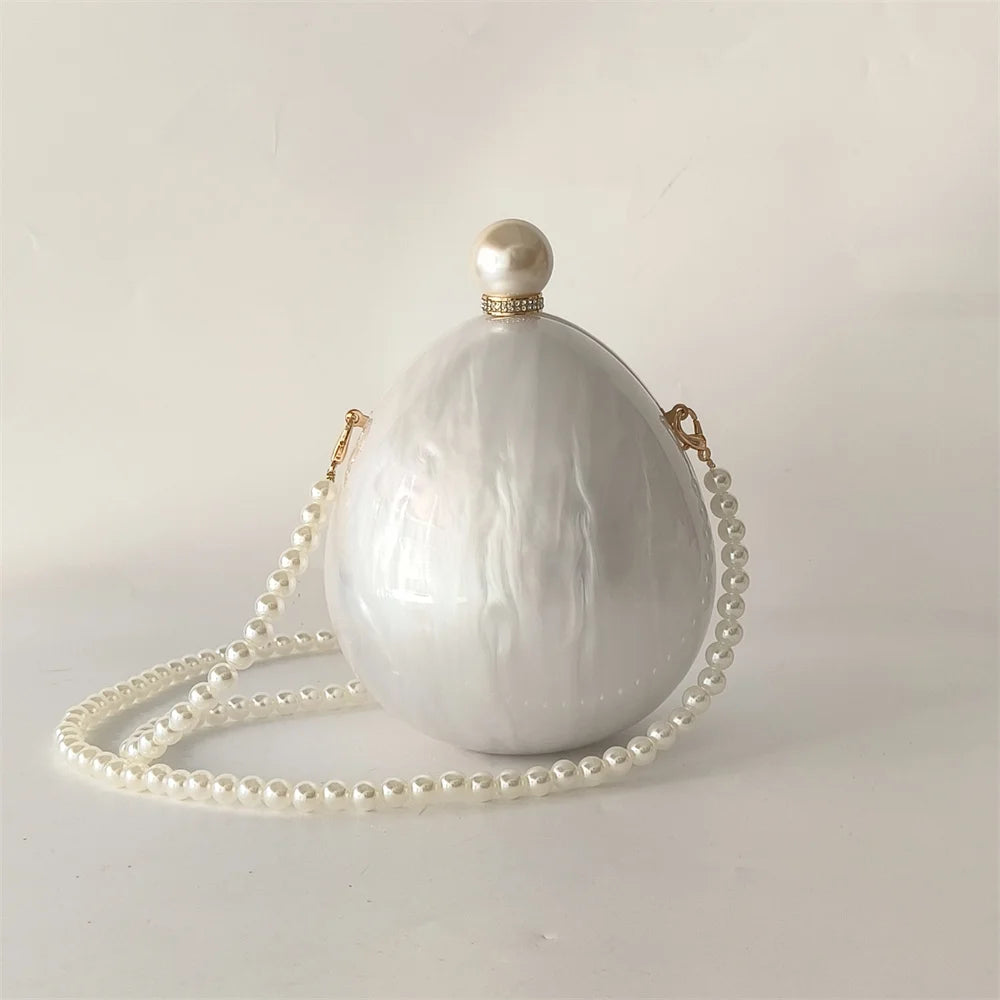 Bolsa Clutch Oval Pérola