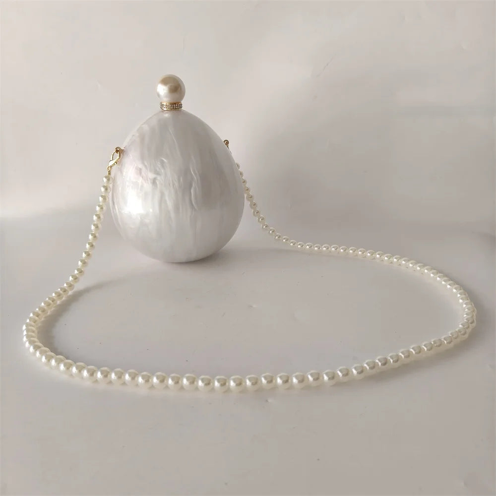 Bolsa Clutch Oval Pérola